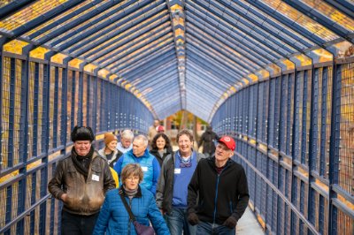 Alumni walking on the Little Mac Bridge